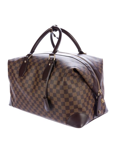 louis vuitton navy duffle bag|louis vuitton duffle bag suitcase.